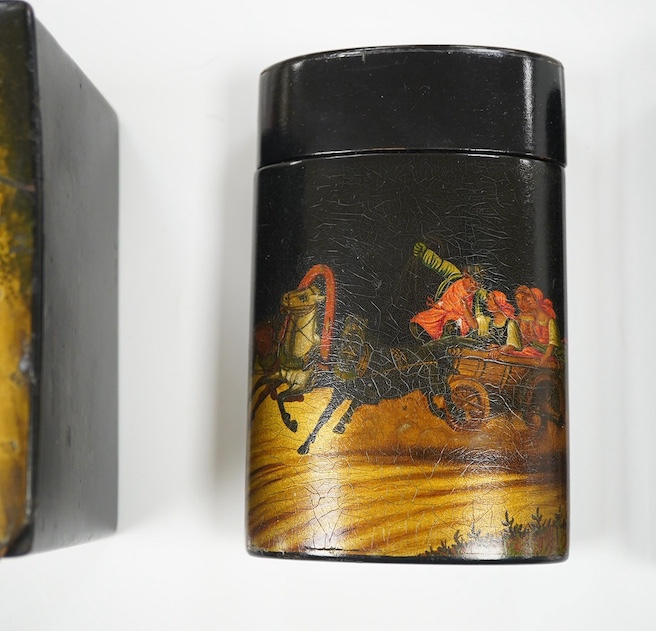 Four Russian lacquer boxes, late 19th/early 20th century, decorated with troika scenes, largest 12cm wide. Condition - fair